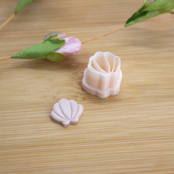 Seashell clay cutter for creating stunning stud polymer clay earrings with intricate details and unique designs