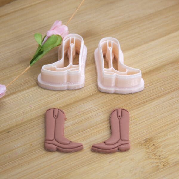 Polymer clay cutters in the shape of cowboy boots, perfect for creating unique and detailed designs with your favorite clay