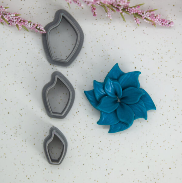 Set of three petal-shaped polymer clay cutters in small, medium, and large sizes, perfect for crafting intricate and realistic polymer clay flowers.