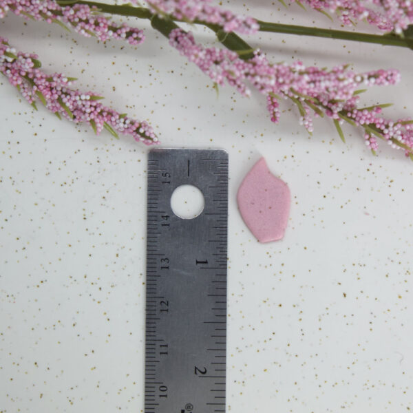 Polymer clay cutters featuring a petal shape, available in small, medium, and large sizes, perfect for creating stunning polymer clay flowers with ease and accuracy.