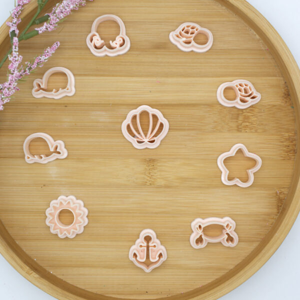 A set of 10 summer-inspired clay cutters, perfect for crafting unique and colorful polymer clay earrings that capture the essence of the sunny season.