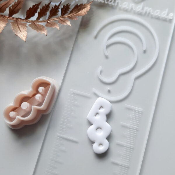 A Boo clay cutter perfectly designed for crafting Halloween-themed polymer clay earrings.