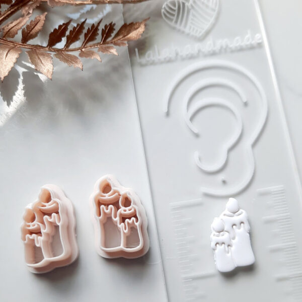 Image featuring a candle-shaped Halloween clay cutter, a prime tool for making one-of-a-kind polymer clay earrings and other Halloween-themed crafts.