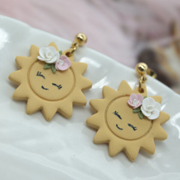 Polymer clay earrings for summer, featuring an irresistible sun shape with a smile