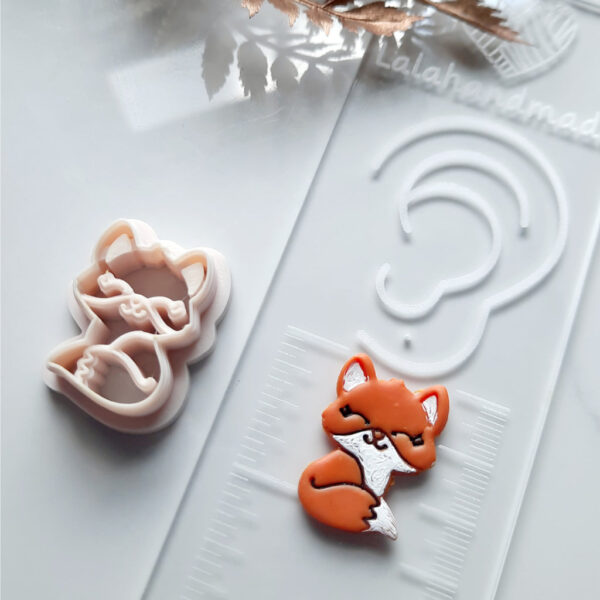 A charming fox-shaped polymer clay cutter, designed specifically for crafting fall-themed polymer clay earrings, showcasing its detailed design and seasonal relevance. Polymer clay cutters for Halloween.