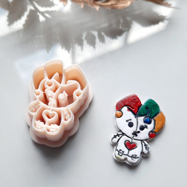 Get spooky with our Halloween polymer clay cutters, featuring a voodoo doll shape