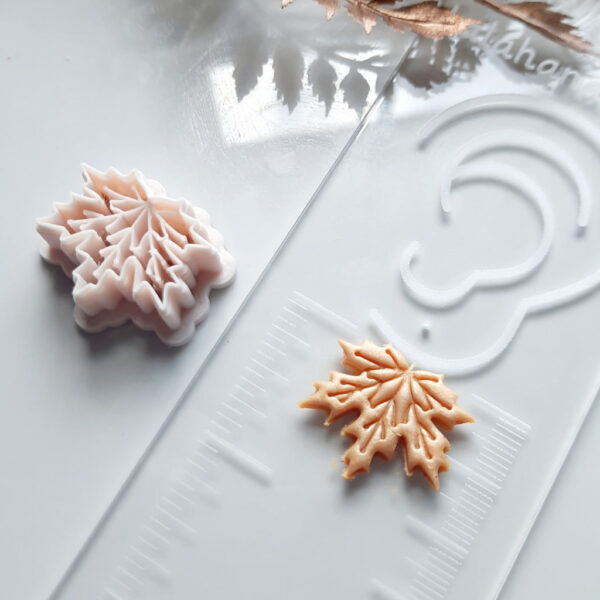 Clay cutter designed for molding polymer clay into beautiful fall-themed earring pieces.