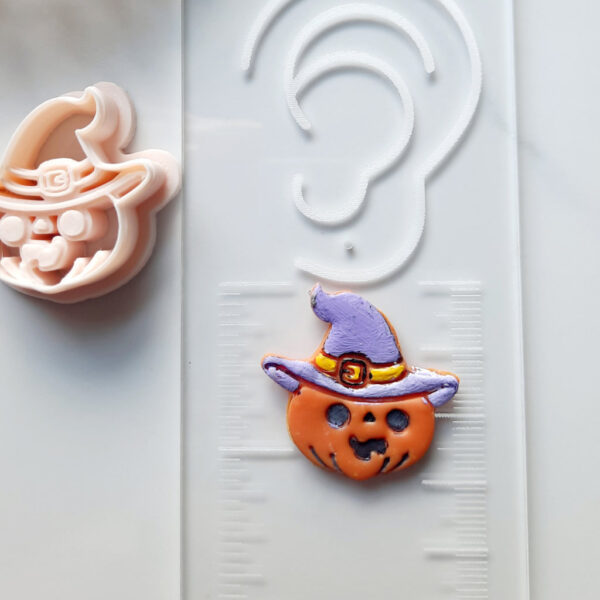 Halloween clay cutter in a whimsical pumpkin with a hat shape, designed specifically for creating polymer clay jewelry