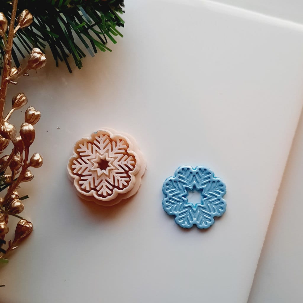 Snowflake-shaped polymer clay cutter perfect for crafting Christmas-themed earrings