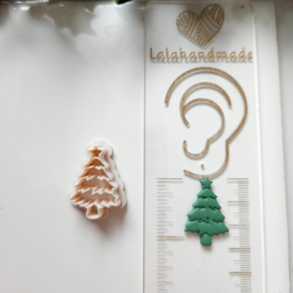 Unique Christmas tree polymer clay cutter with a star, perfect for creating festive earrings