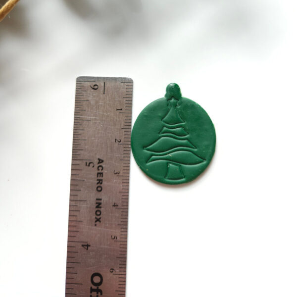 "Polymer clay cutter in a festive Christmas tree ornament design, ideal for handmade earring creation