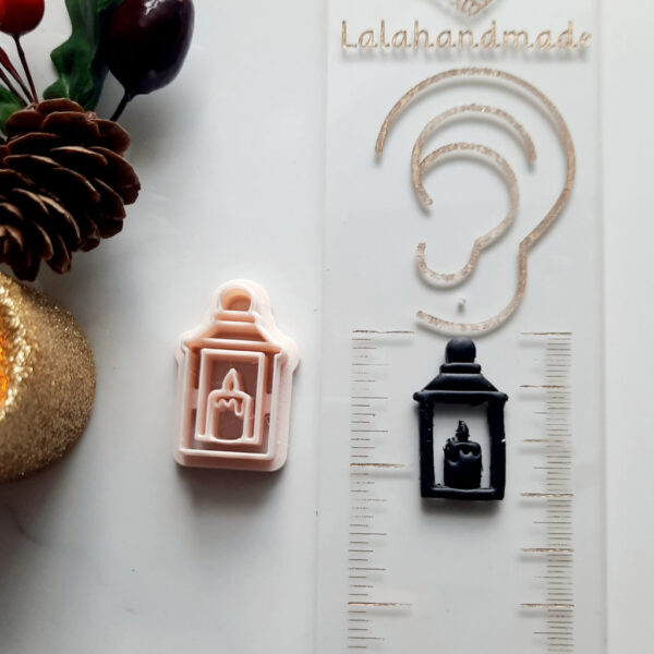 Holiday craft tool: Lantern-shaped polymer clay cutter.