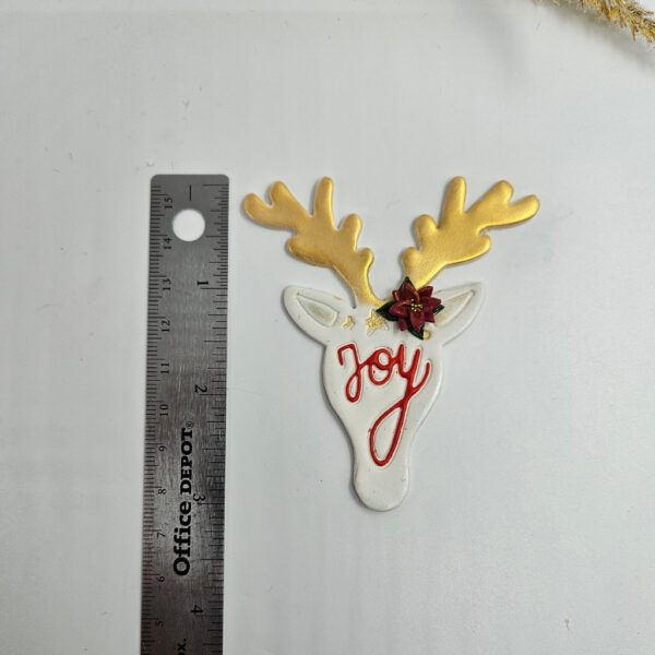 Christmas-themed reindeer polymer clay cutter for handcrafting unique holiday ornaments.