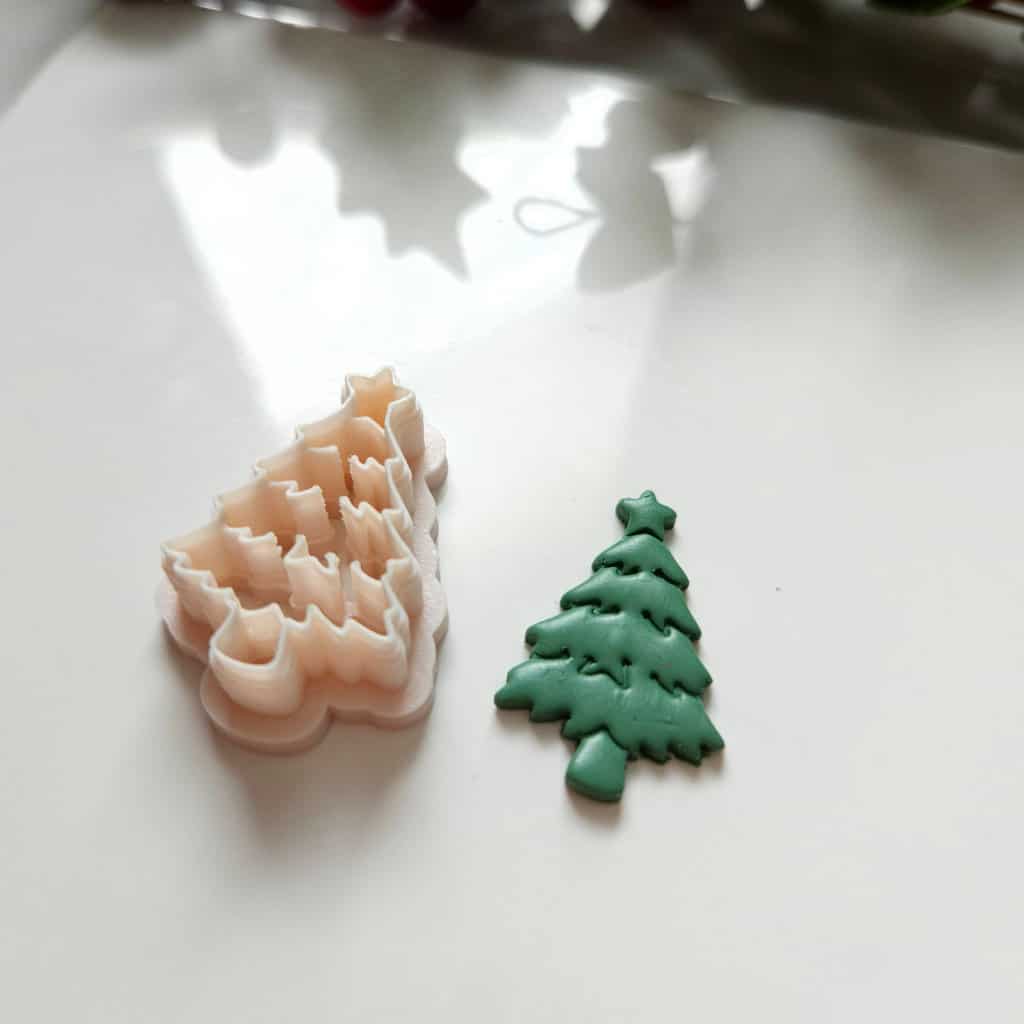 Christmas tree-shaped polymer clay cutter with star detail for festive earrings making