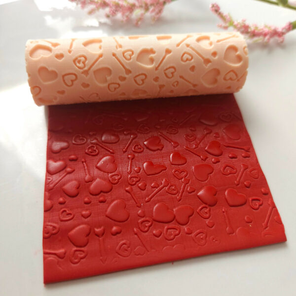 Get your polymer clay ready for Valentine's with this heart and arrow texture roller.