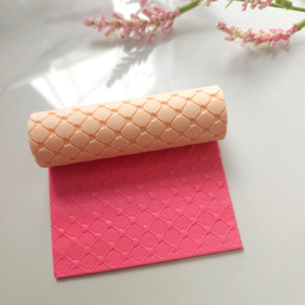 Texture roller for making heart-shaped patterns on polymer clay