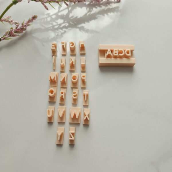 A collection of durable letter stamping kits for clay enthusiasts.